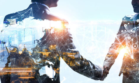 Close up of two businesspeople shaking hands against modern cityscape background. 3d rendering